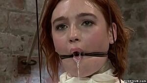 Corded ball-gagged red-haired all girl flagellated